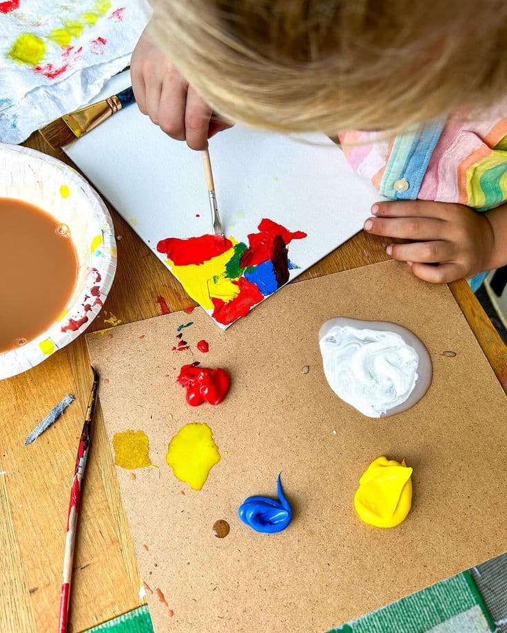 Kids painting mid-class